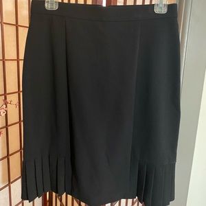Black East 5th a-line skirt with pleats. Size 8